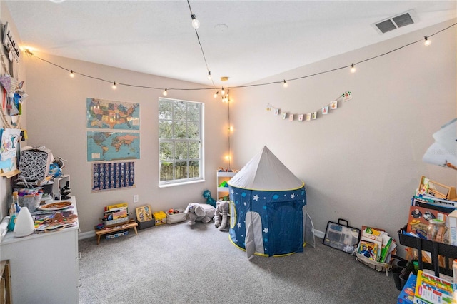 game room with visible vents and carpet flooring