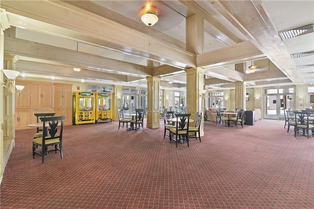 interior space featuring carpet flooring, french doors, visible vents, and ornate columns