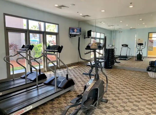 gym with carpet flooring, recessed lighting, and visible vents