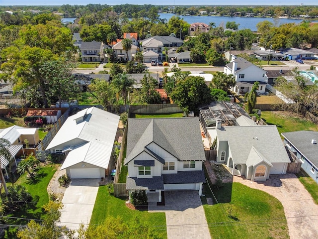 aerial view featuring a residential view and a water view