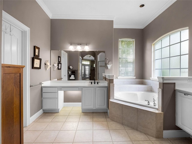 bathroom featuring vanity, crown molding, and a garden tub