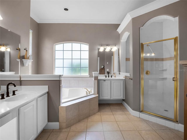 full bath with a garden tub, crown molding, a stall shower, and a sink