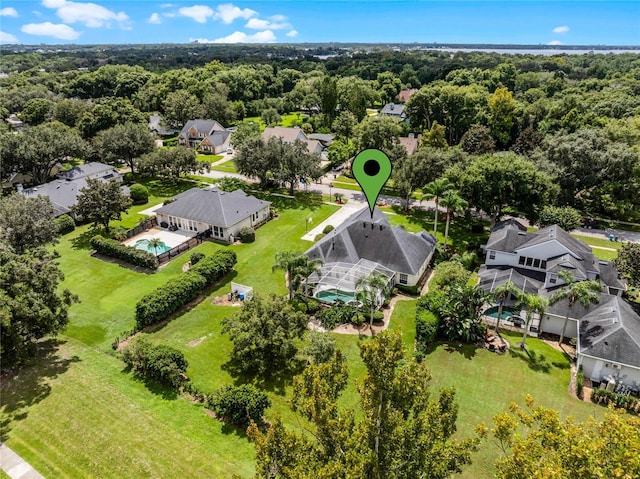 birds eye view of property with a residential view