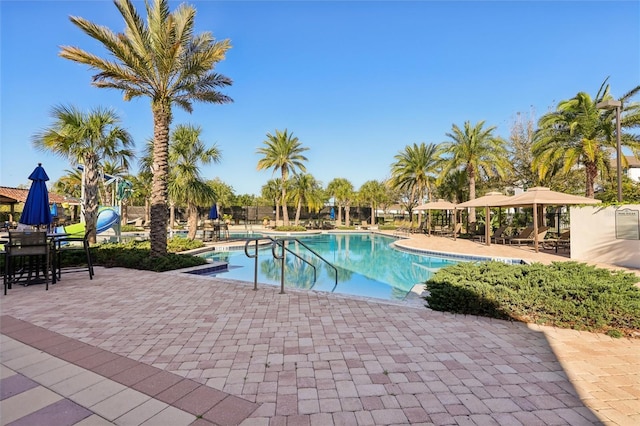 community pool featuring a patio