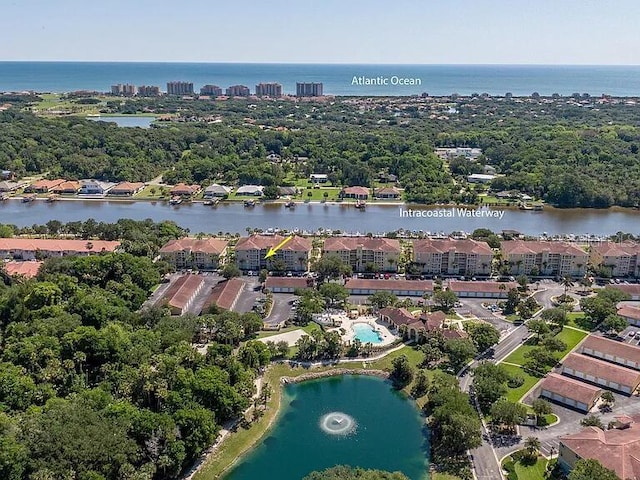 drone / aerial view featuring a water view