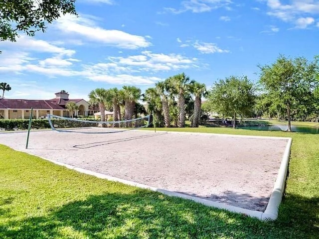 view of community featuring a yard and volleyball court