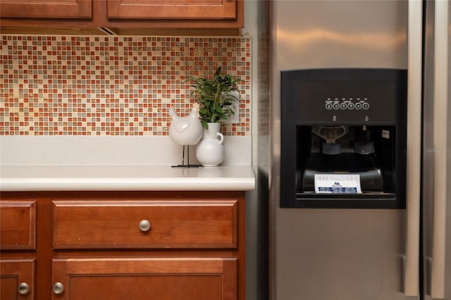 details with light countertops and brown cabinetry