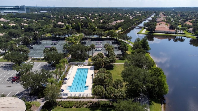 birds eye view of property with a water view