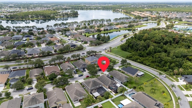 aerial view with a residential view and a water view