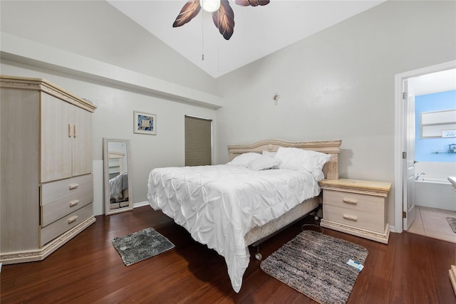 bedroom with ensuite bath, wood finished floors, ceiling fan, and vaulted ceiling