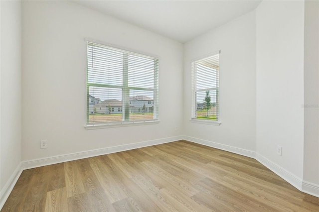 16354 Silver Grove Blvd, Winter Garden, FL 34787 - spare room with light wood-style floors and baseboards