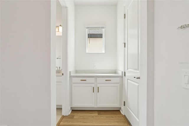 16354 Silver Grove Blvd, Winter Garden, FL 34787 - corridor featuring light wood-style flooring