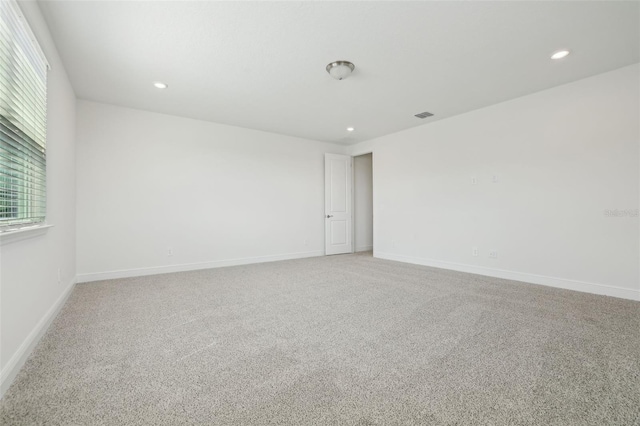 16354 Silver Grove Blvd, Winter Garden, FL 34787 - unfurnished room featuring light colored carpet, recessed lighting, and baseboards