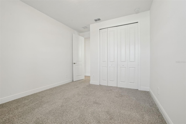 16354 Silver Grove Blvd, Winter Garden, FL 34787 - unfurnished bedroom with carpet, baseboards, and a closet