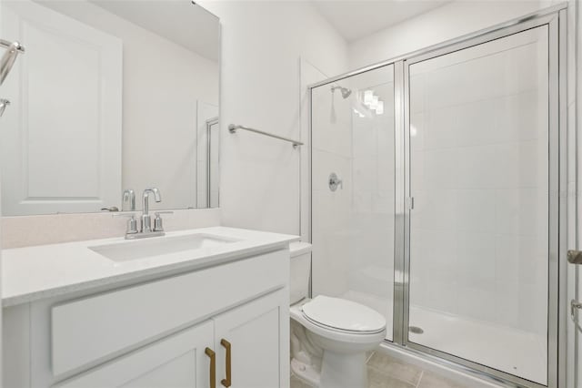 16354 Silver Grove Blvd, Winter Garden, FL 34787 - full bathroom with a shower stall, toilet, vanity, and tile patterned flooring