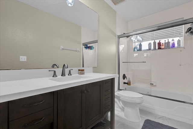 bathroom with visible vents, shower / washtub combination, toilet, marble finish floor, and vanity