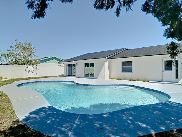 view of pool with a fenced in pool, a patio, and a fenced backyard