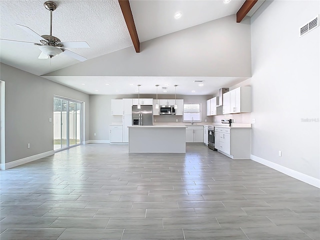 unfurnished living room featuring beamed ceiling, visible vents, baseboards, and ceiling fan