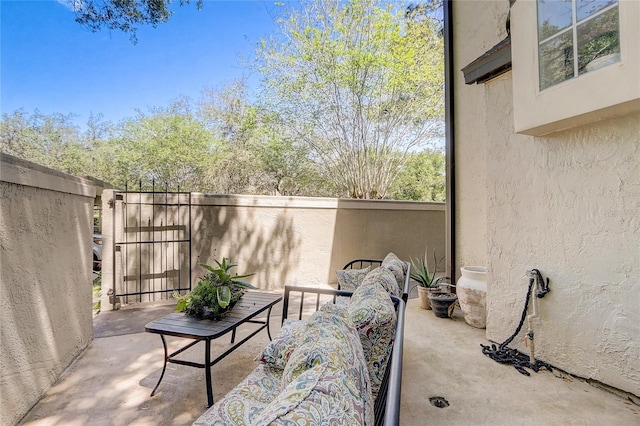 view of patio with fence