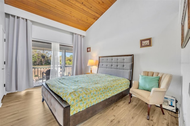 bedroom featuring high vaulted ceiling, wood ceiling, wood finished floors, and access to outside