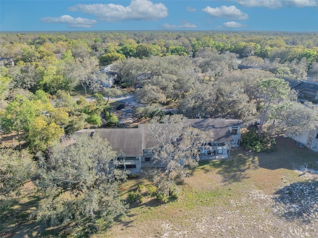 aerial view with a wooded view