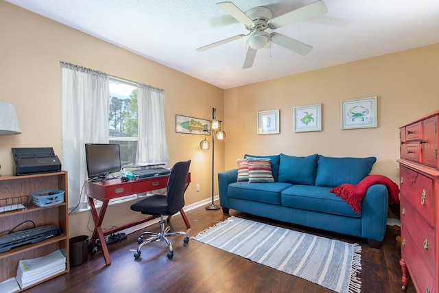 home office with baseboards, wood finished floors, and a ceiling fan