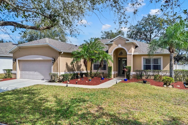 ranch-style house with stucco siding, driveway, and a front yard