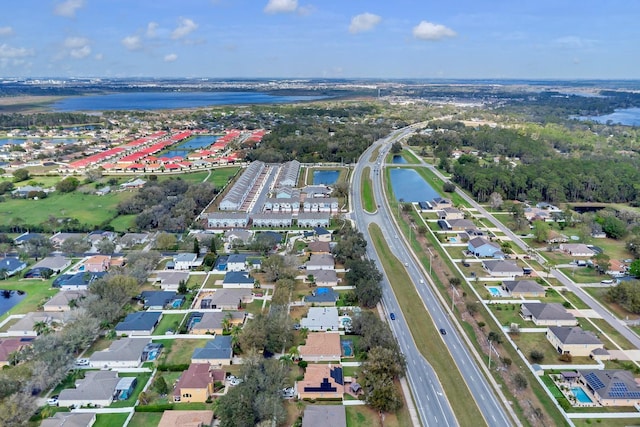 drone / aerial view with a water view