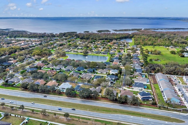 birds eye view of property featuring a residential view and a water view