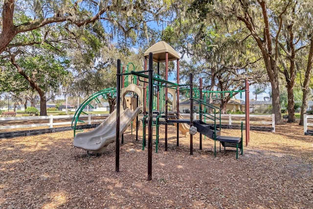 community play area featuring fence