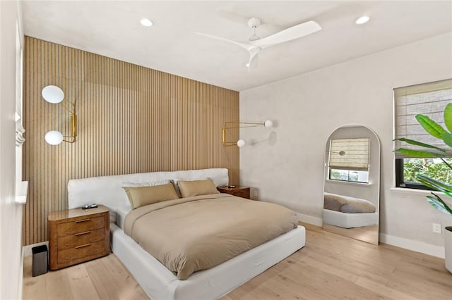 bedroom with recessed lighting, wood finished floors, baseboards, and ceiling fan