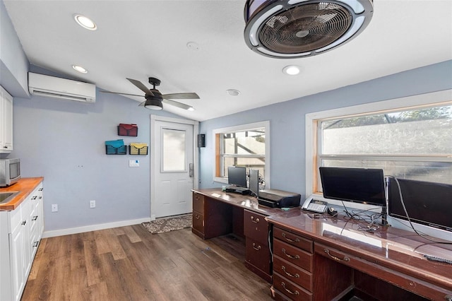 1475 Kettledrum Trl, Deltona, FL 32725 - office area featuring a wall unit AC, a ceiling fan, lofted ceiling, dark wood finished floors, and recessed lighting