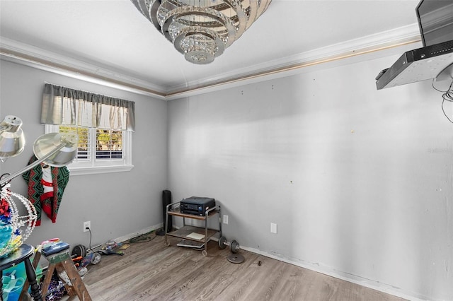 1475 Kettledrum Trl, Deltona, FL 32725 - misc room with wood finished floors, a chandelier, and ornamental molding