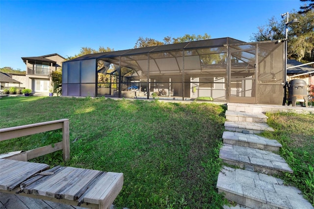 1475 Kettledrum Trl, Deltona, FL 32725 - view of green lawn featuring glass enclosure