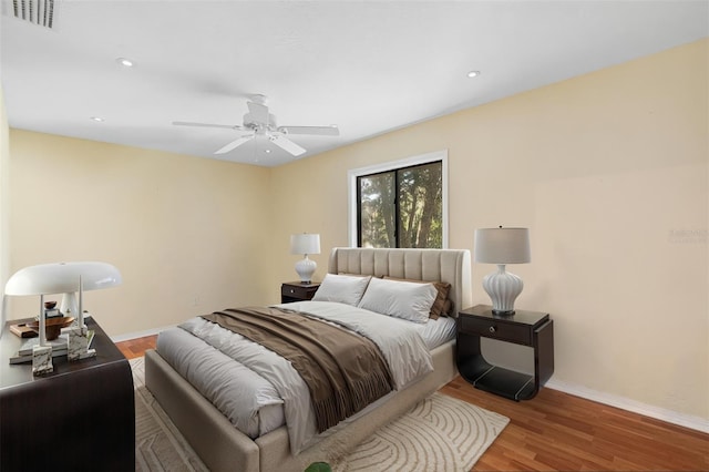 1475 Kettledrum Trl, Deltona, FL 32725 - bedroom featuring wood finished floors, baseboards, recessed lighting, and ceiling fan
