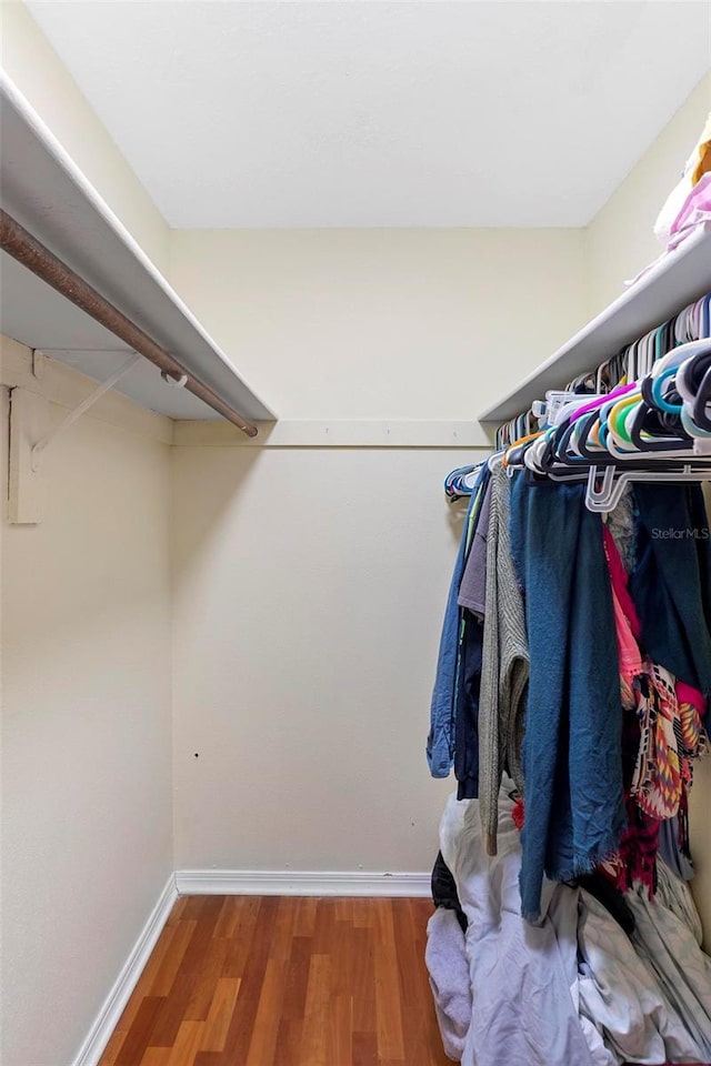 1475 Kettledrum Trl, Deltona, FL 32725 - spacious closet featuring wood finished floors