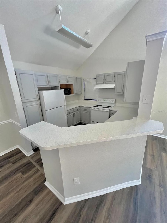 kitchen with gray cabinets, dark wood finished floors, white appliances, a peninsula, and lofted ceiling