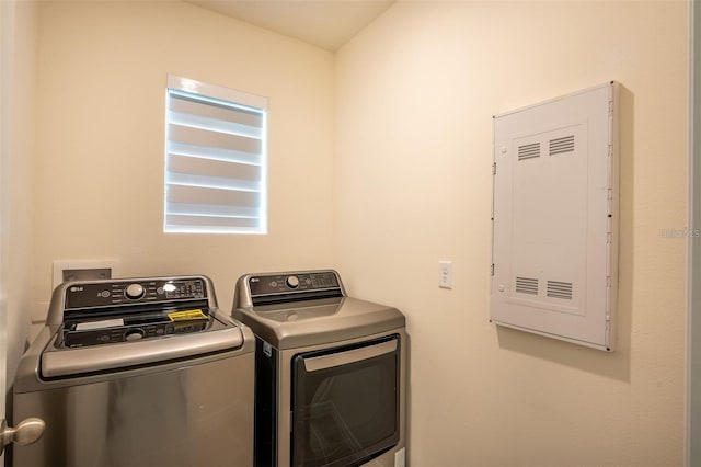 laundry area with laundry area and washer and dryer