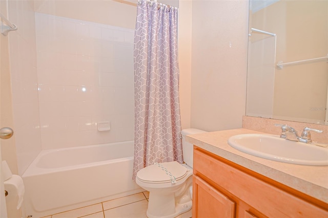 full bathroom with tile patterned floors, shower / bathtub combination with curtain, toilet, and vanity