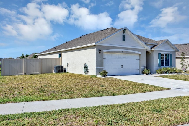 view of home's exterior featuring stucco siding, a lawn, a garage, and a gate