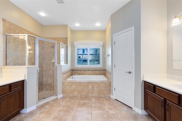 full bath featuring visible vents, a shower stall, tile patterned floors, a bath, and vanity