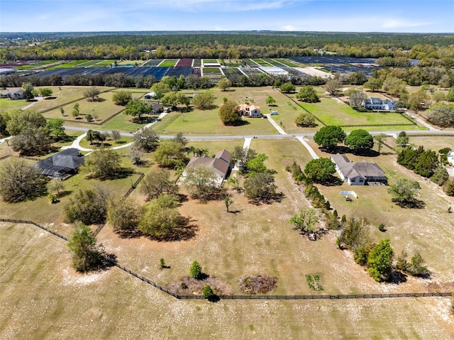 birds eye view of property featuring a rural view