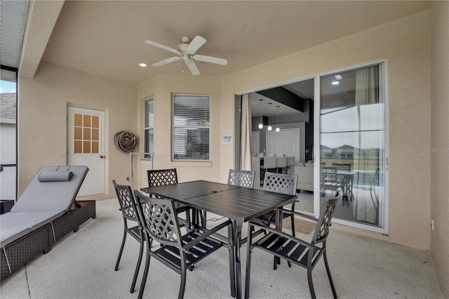 view of patio / terrace featuring ceiling fan and outdoor dining space