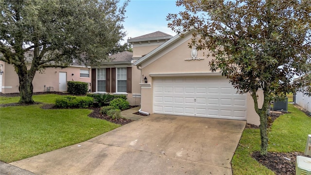 view of front of property featuring central AC unit, an attached garage, stucco siding, a front lawn, and concrete driveway