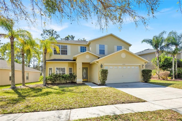 traditional-style home with a front lawn, driveway, and stucco siding