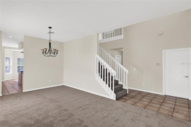 interior space with stairway, baseboards, visible vents, tile patterned flooring, and a chandelier