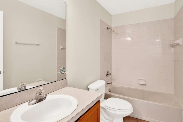 bathroom featuring tub / shower combination, toilet, vanity, and tile patterned floors