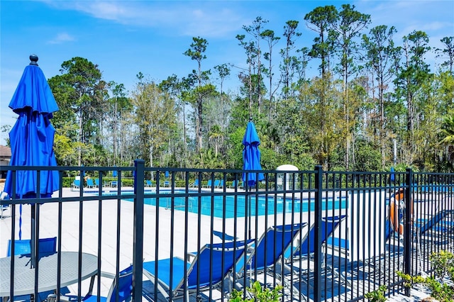 pool featuring fence