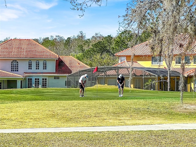 view of community featuring a yard