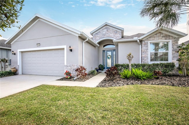 ranch-style home with stone siding, stucco siding, a front lawn, and a garage